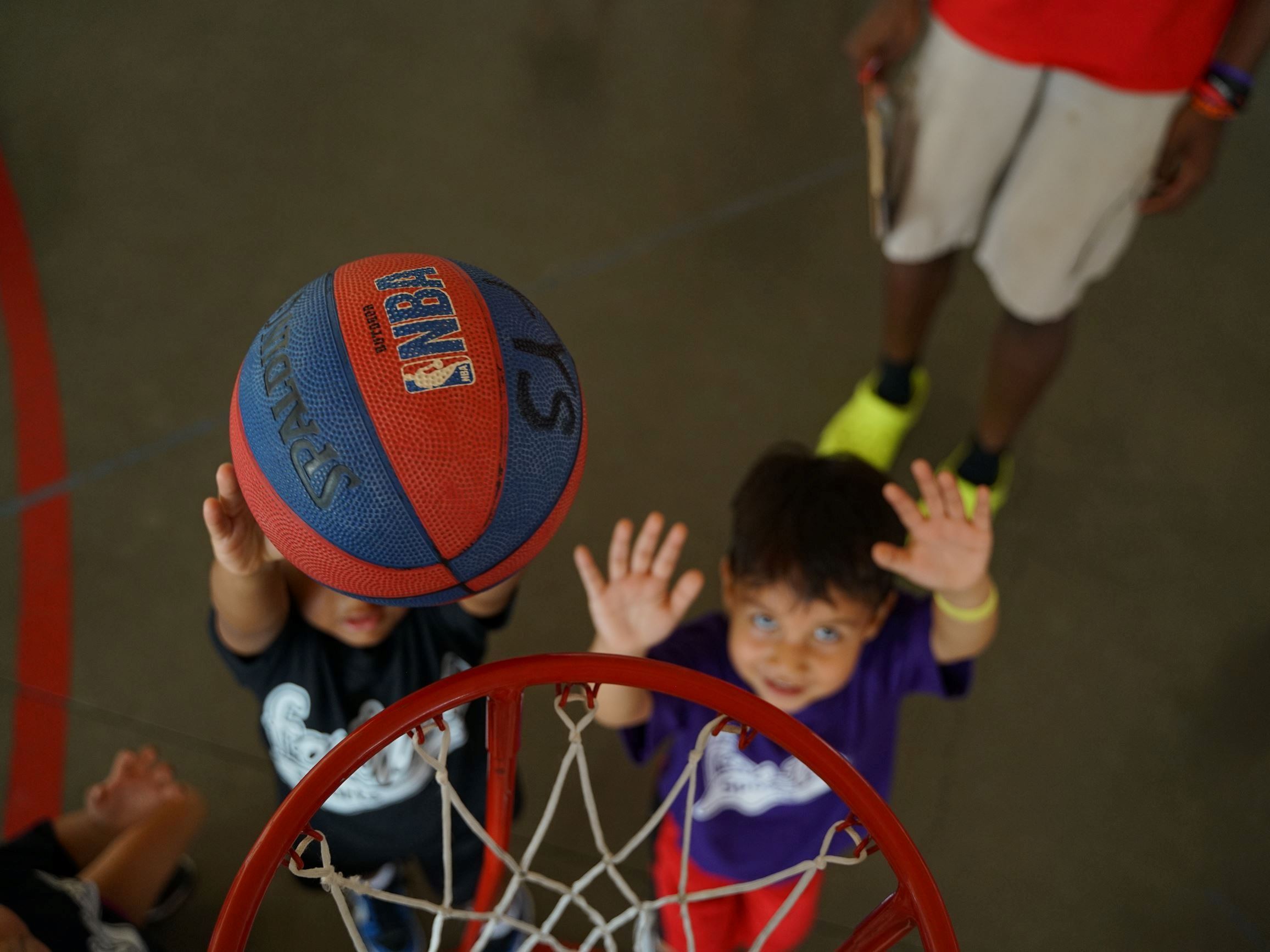 Youth playing basketball